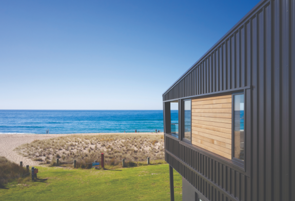 Steel cladded building by sea