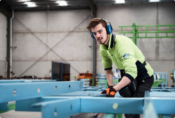 BlueScope Employee assembling steel frame