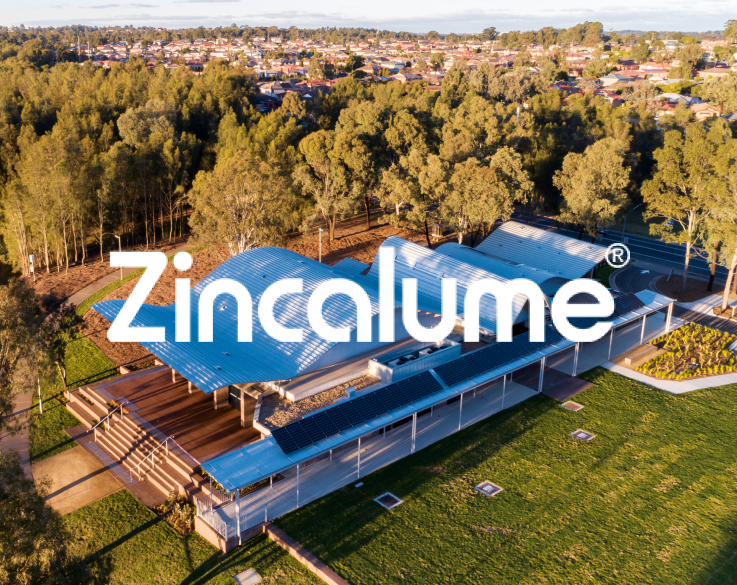 Ariel view of Woodcroft Neighbourhood Centre, Woodcroft, NSW. Features serpentine roof made from ZINCALUME® steel in Fielders FreeForm® profile.